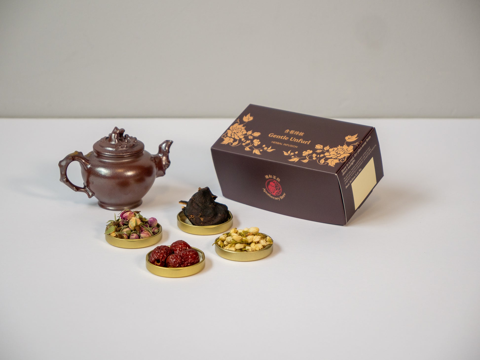 Aromatic TCM blend Gentle Unfurl by Apothecary Brew, featuring whole Rose Buds, Jasmine Flowers, and Tangerine Peel to release stagnant Qi and soothe stress-induced bloating.